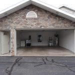 side-door-garage-door-open-to-show-garage-space