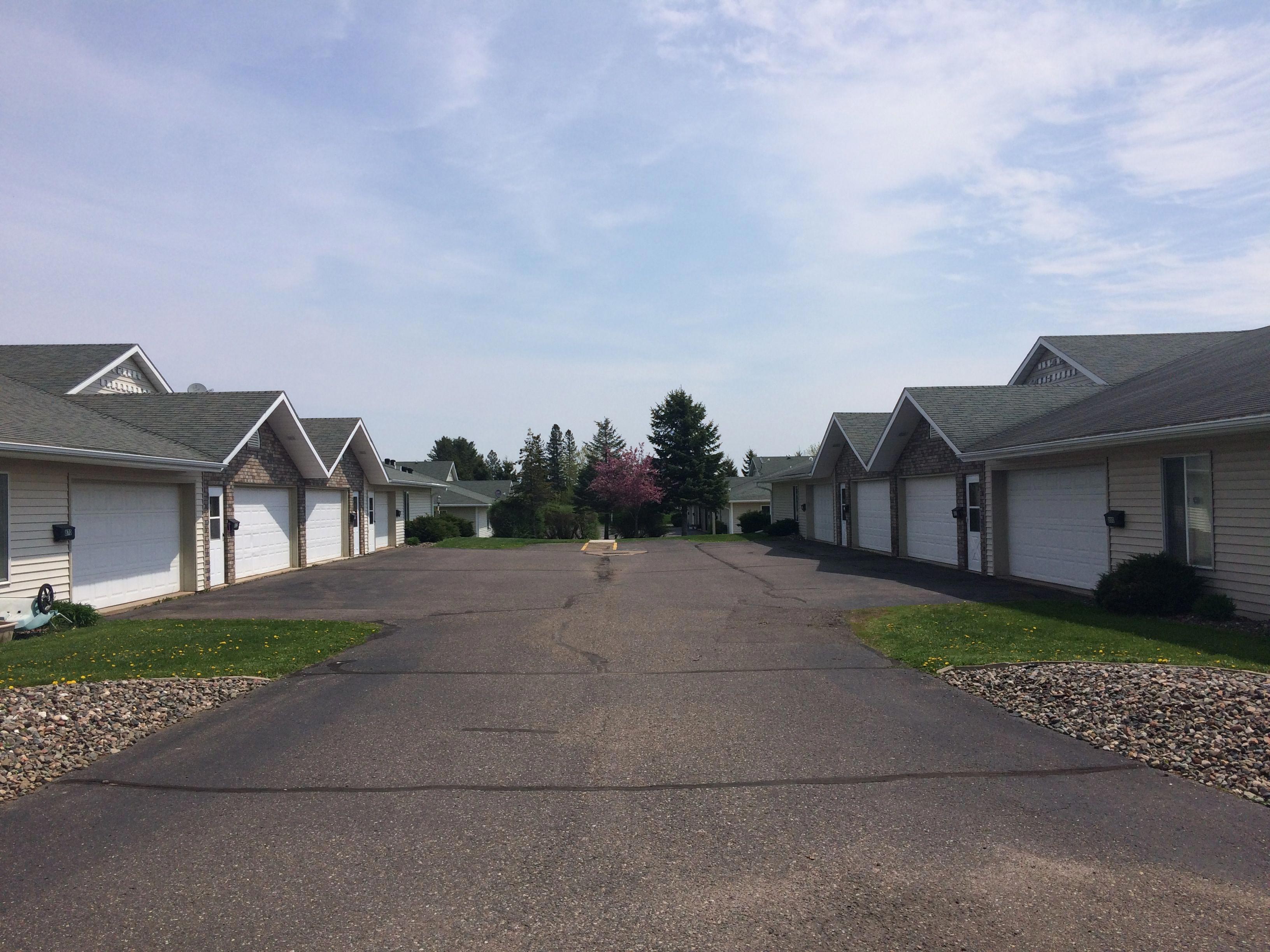 paved-driveway-parking-lot-infront-of-garages