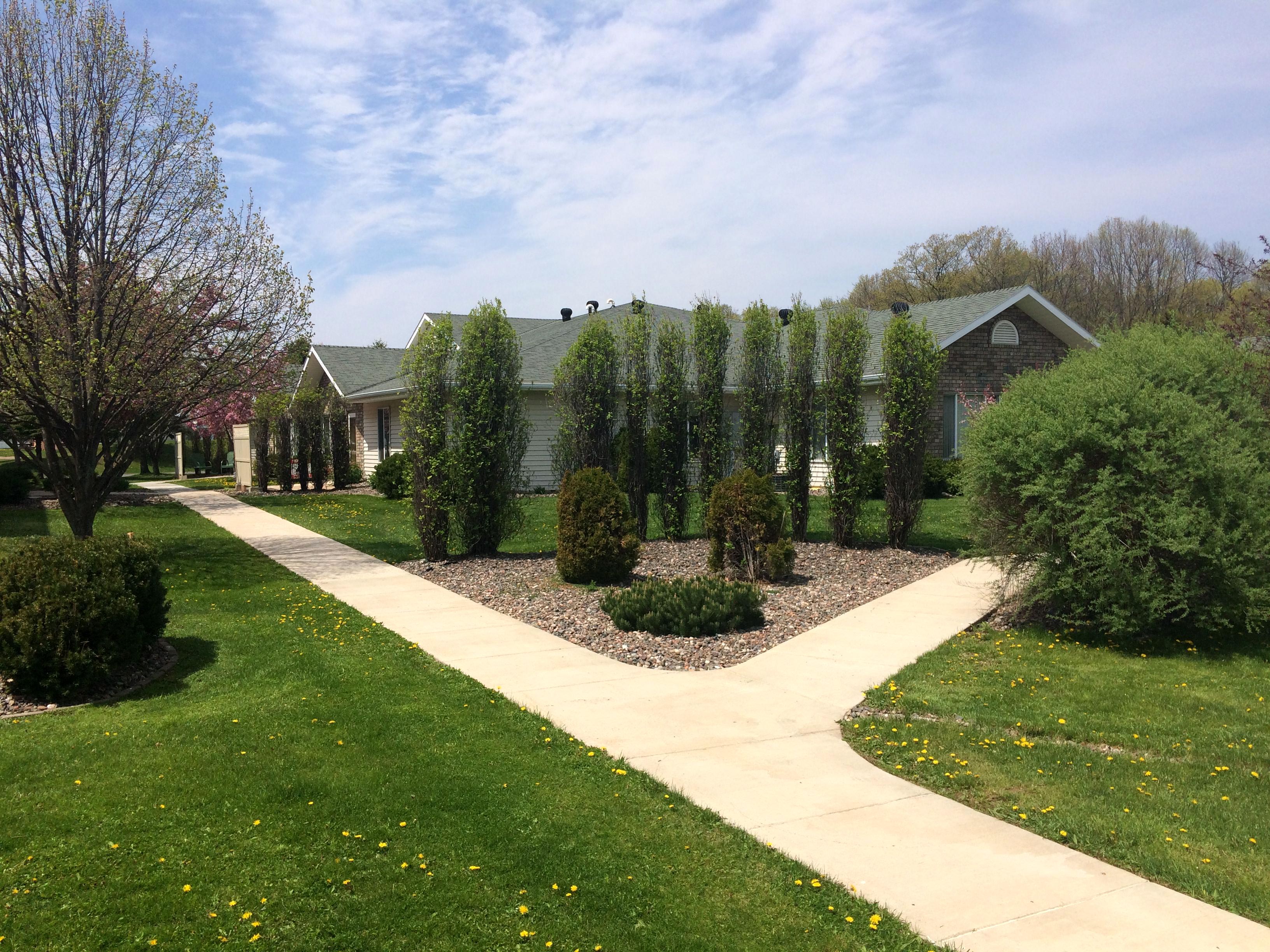 grass-and-shrubs-at-allman-park-condos