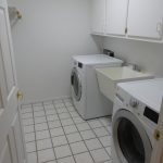 white-tile-white-washer-dryer-utility-sink