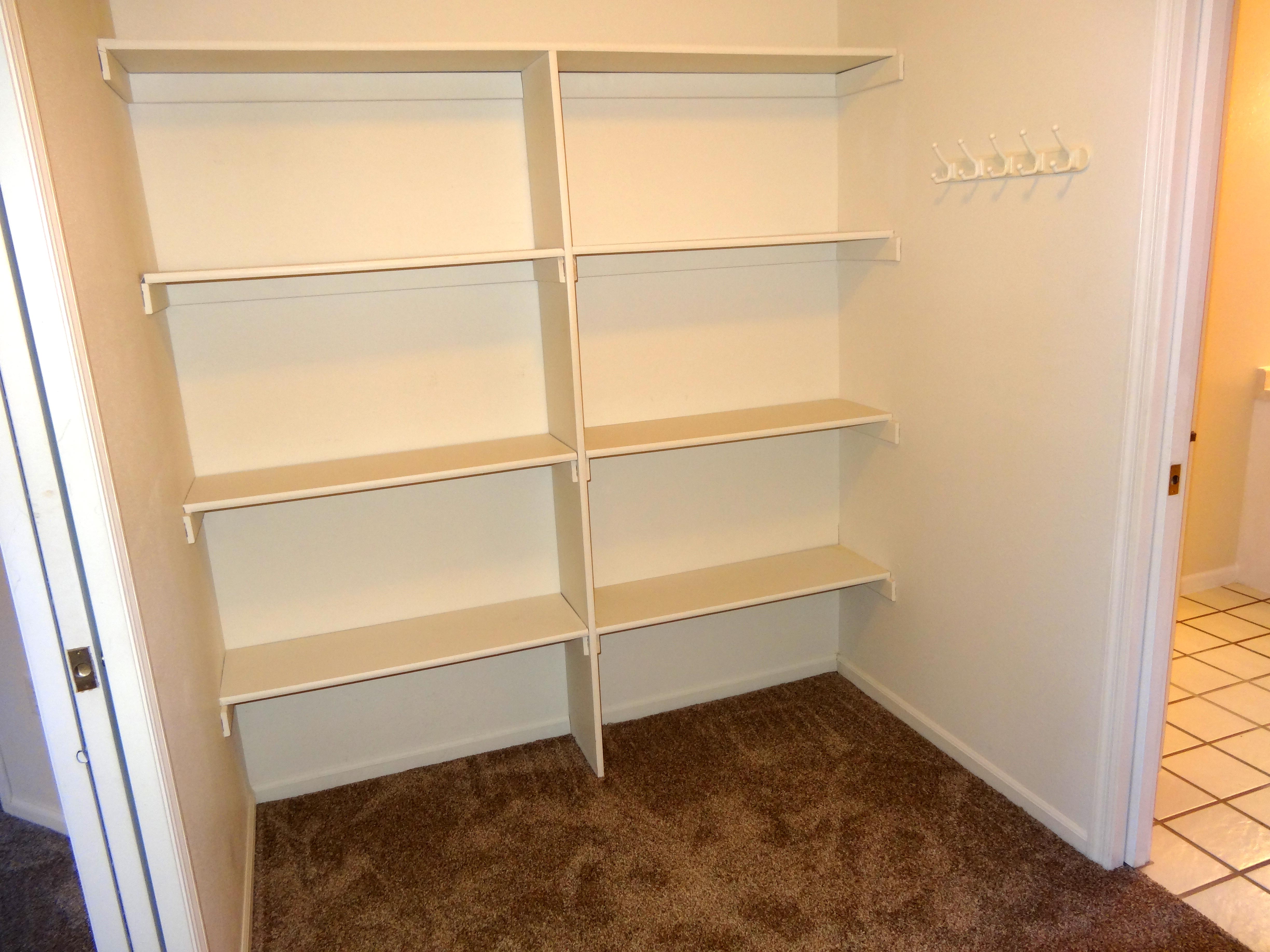 shelving-shown-in-walk-in-closet